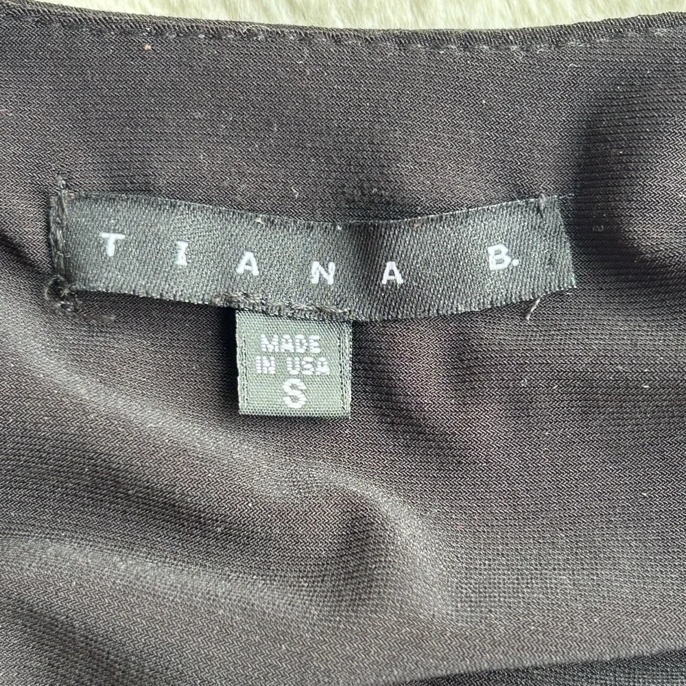 Tiana B. Dress with tiered skirt. Sleeveless. Size S. Black.
